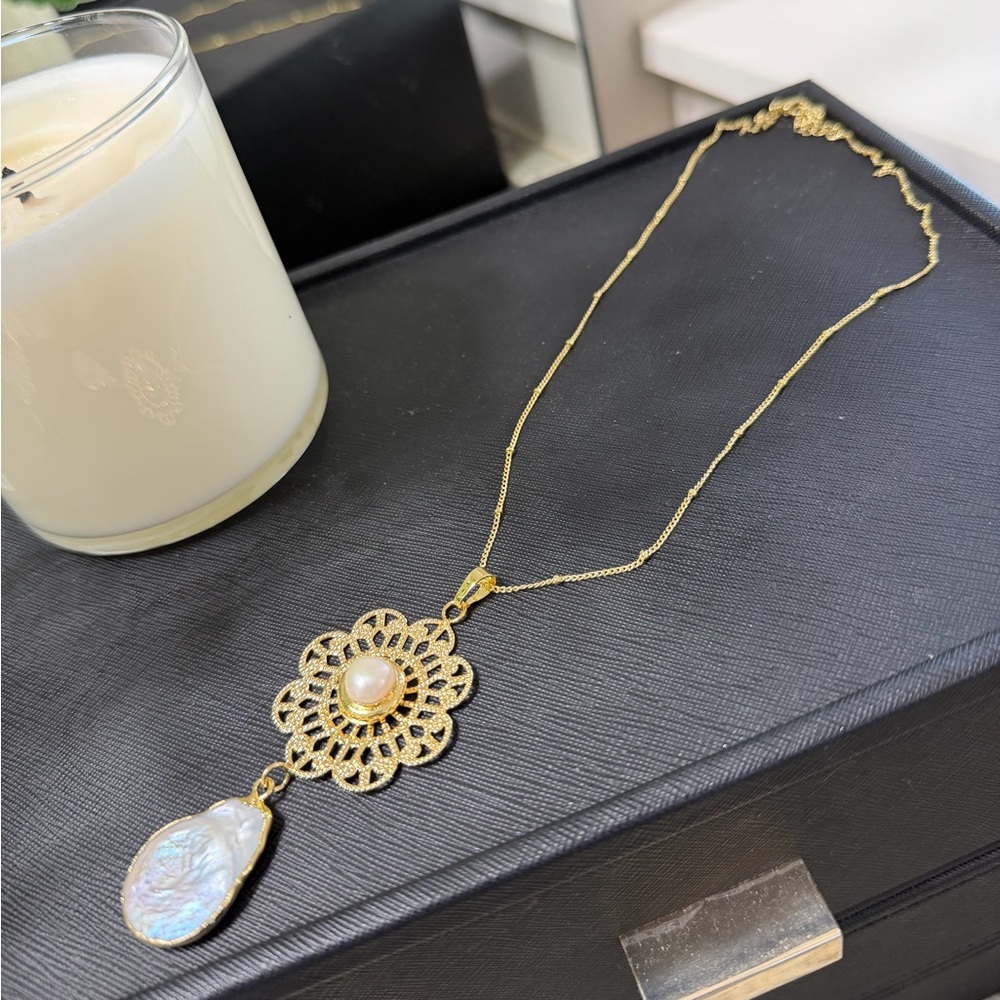 Gold Floral Pendant Necklace with Pearl Accent